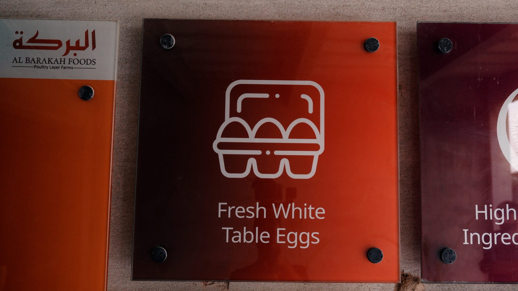 Al Barakah Foods branding beside the Fresh White Table Eggs badge